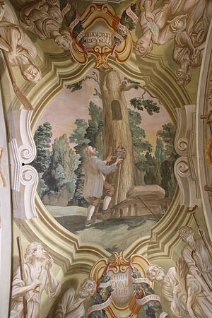 Wandmalerei unter der Orgelempore: Alexander Schinagl beim Einsetzen des Vesperbildes
